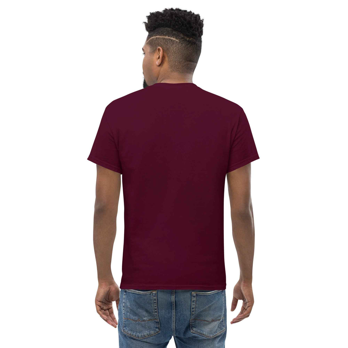 Maroon unisex classic tee: back view on a male model, styled and paired with classic blue jeans against a studio backdrop