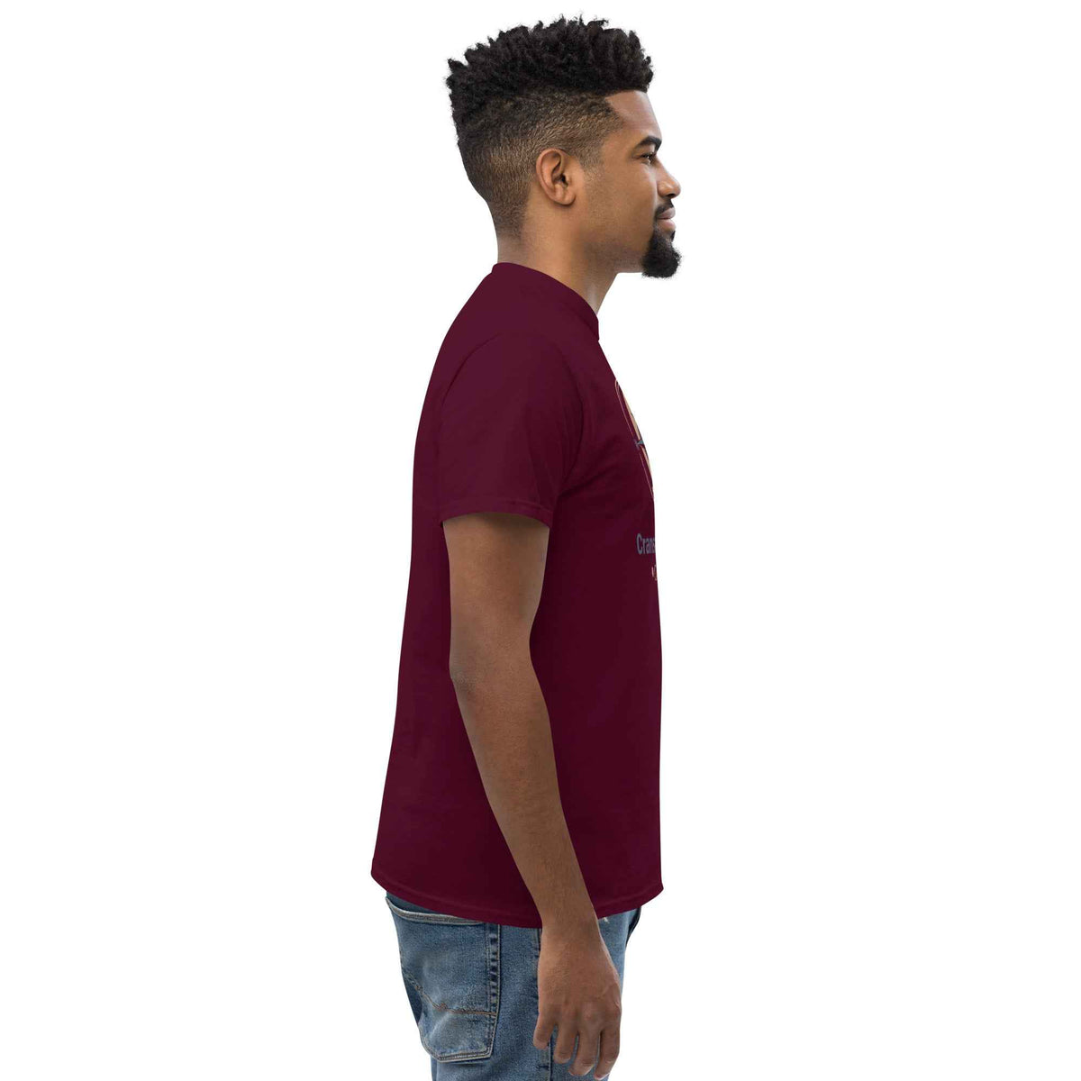 Maroon unisex t-shirt featuring the Cranston's Mariner Coffee Beans logo compass and cup design, on a male model facing right