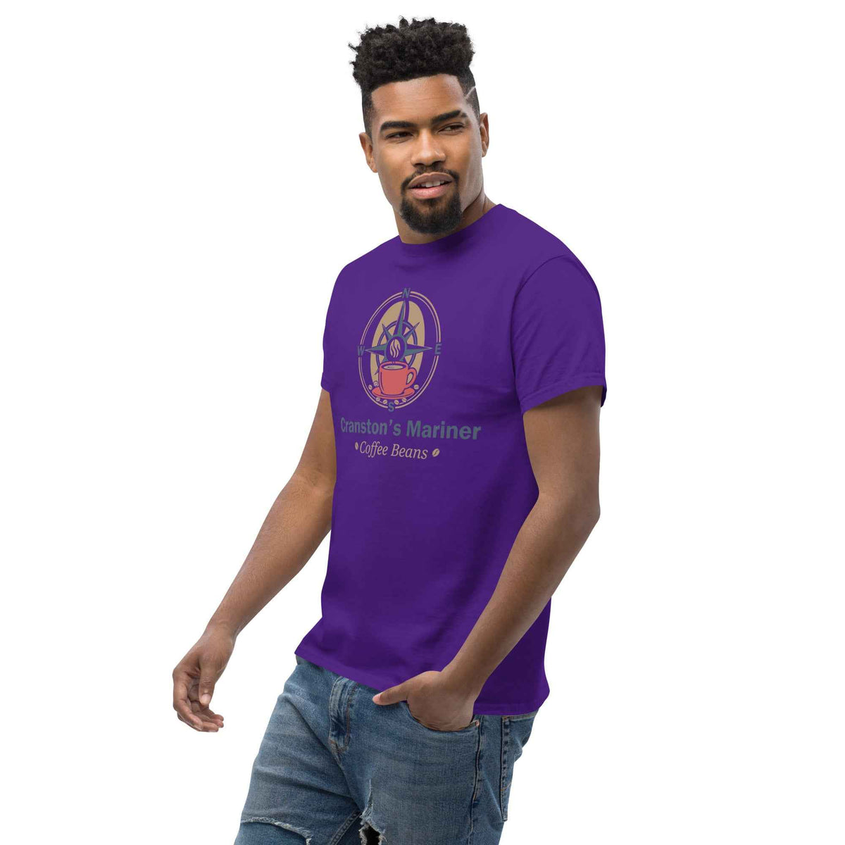 Purple unisex classic tee with Cranston's Mariner Coffee Beans design, slight left three-quarter angle on a male studio model