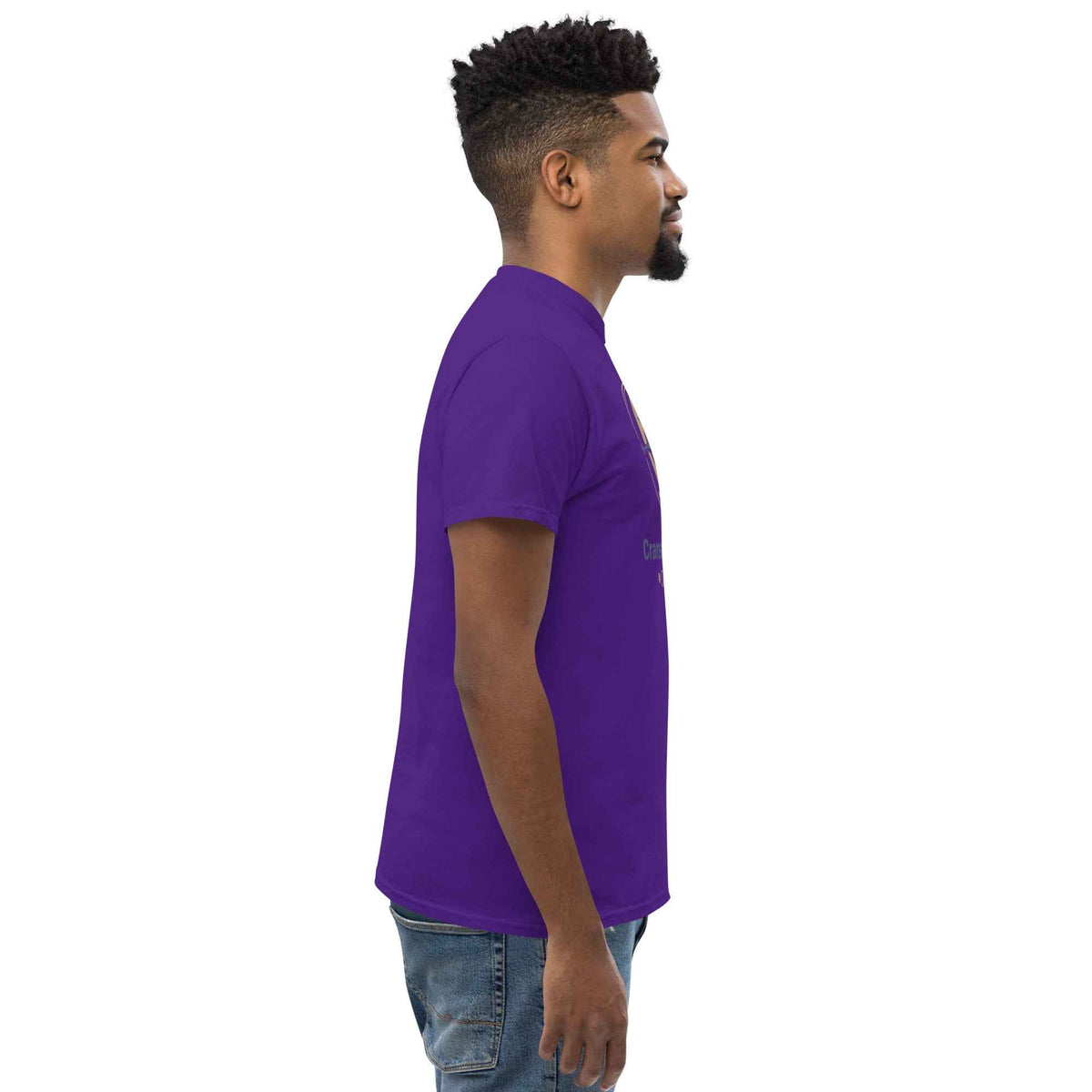 Purple unisex classic tee having Cranston's Bean & Mariner Coffee design logo; profile viewed facing right on a male model
