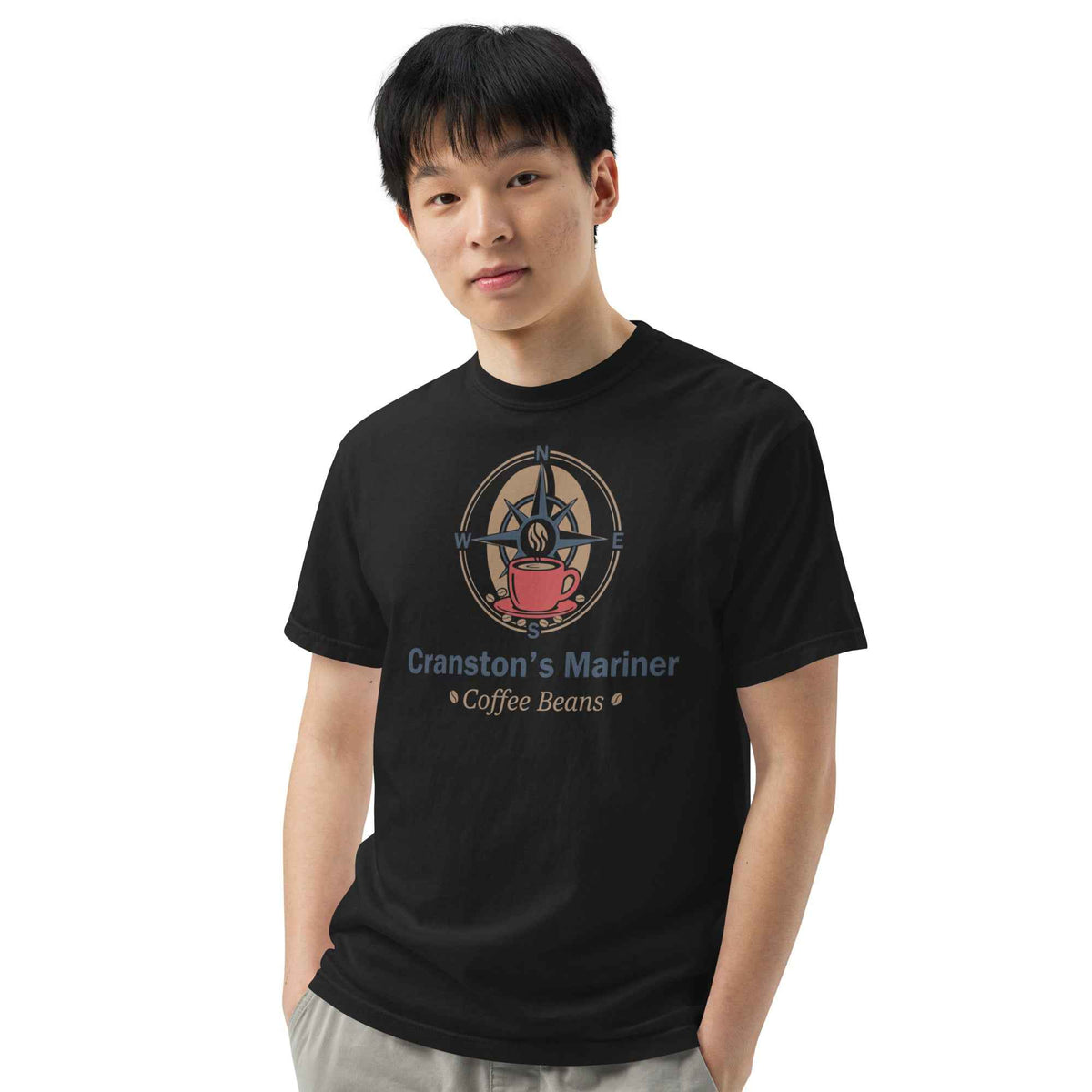 Unisex Garment-Dyed Heavyweight T-shirt by Cranston Bean Mariner, showcasing our signature chest logo on male posed to left