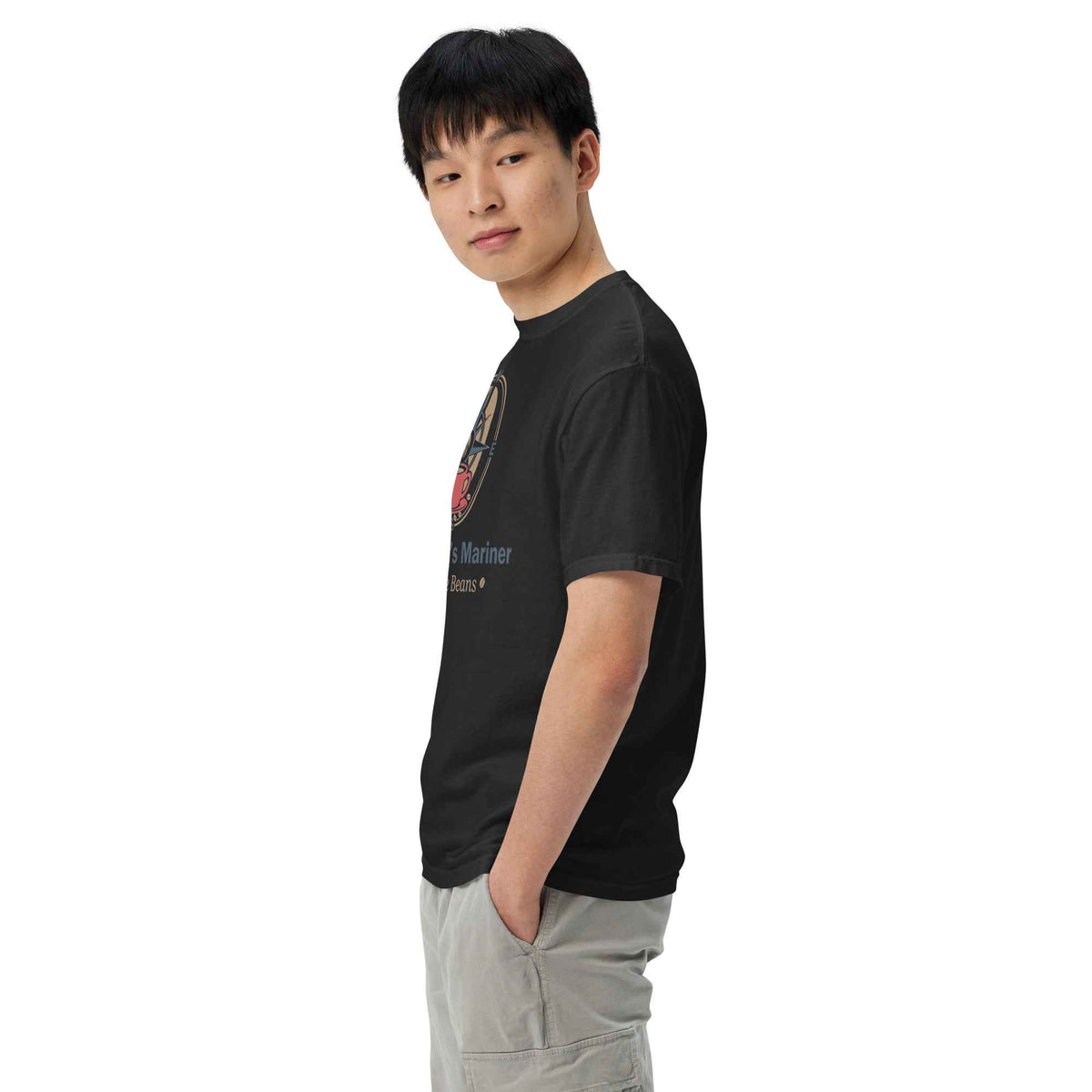 Unisex Garment-Dyed Heavyweight T-shirt by Cranston Bean Mariner, showing a side profile view on male model looking forward