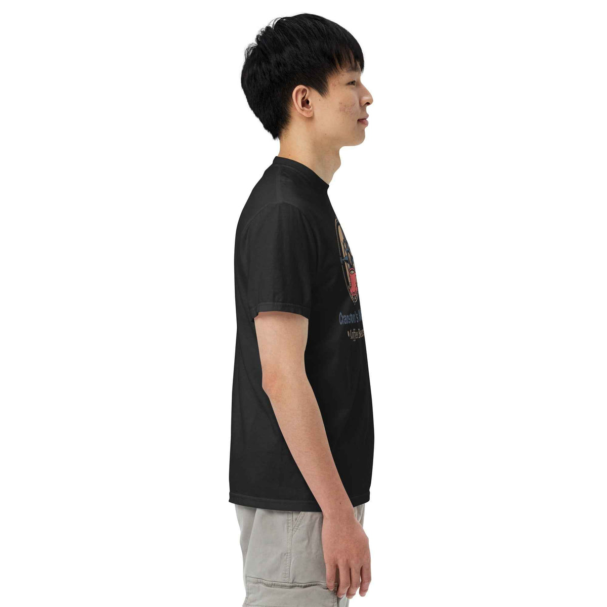 Unisex Garment-Dyed Heavyweight T-shirt by Cranston Bean Mariner, showing a side profile view with model head looking right