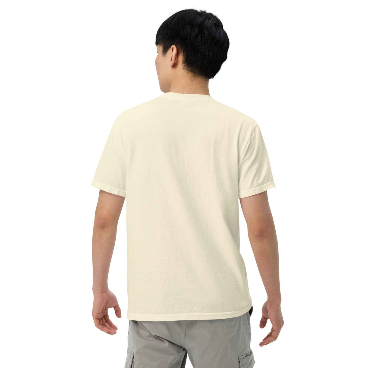 Unisex Garment-Dyed Heavyweight Ivory T-shirt by Cranston Bean Mariner. Model rearview with slight right looking direct left