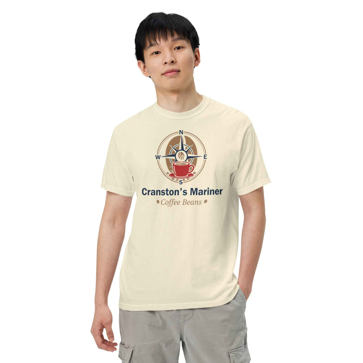 Unisex Garment-Dyed Heavyweight Ivory Color T-shirt by Cranston Bean Mariner. Model leaning head left, hand in left pocket
