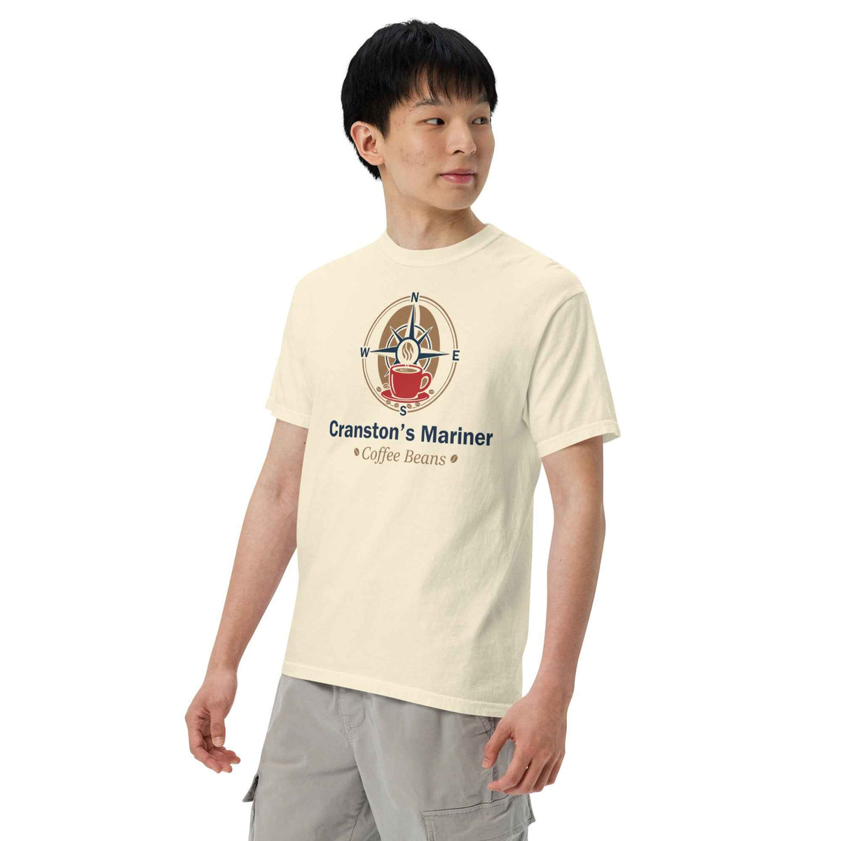 Unisex Garment-Dyed Heavyweight Ivory T-shirt by Cranston Bean Mariner. Model three-fourths lean, eyes looking right of view