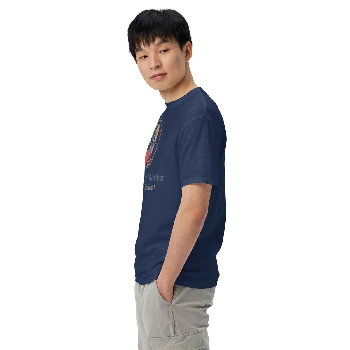 Unisex Garment-Dyed Heavyweight T-shirt by Cranston Bean Mariner, showing model pose left with head down and eyes forward