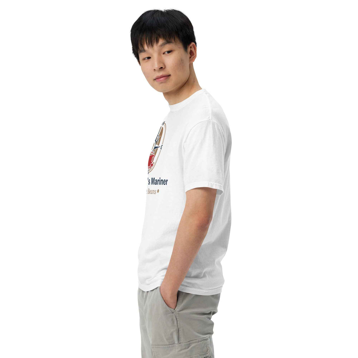 Unisex Garment-Dyed Heavyweight T-shirt by Cranston Bean Mariner, side view model hands in pockets head down eyes forward box