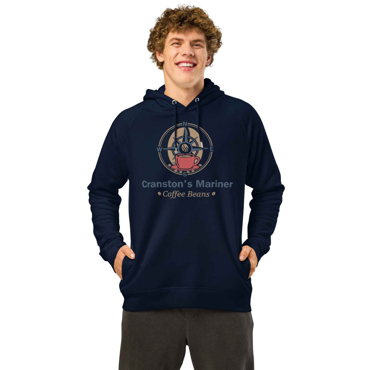 Unisex Organic Side Pocket Hoodie by Cranston Bean Mariner, showing a model smiling pose forward fingers hands in pockets
